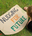 Plakat mit der Aufschrift "Nudging for Future"